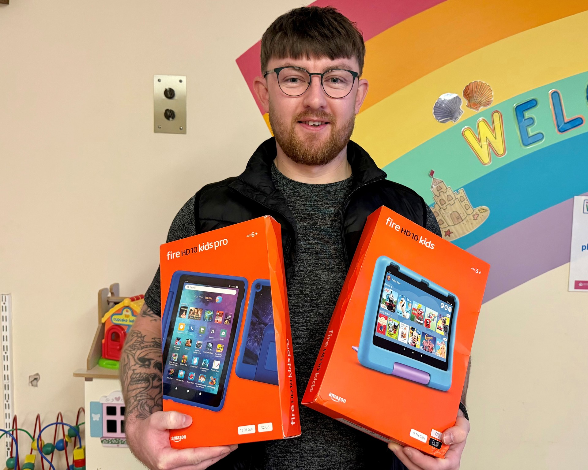 Matt Lamb with Amazon Fire tablets.
