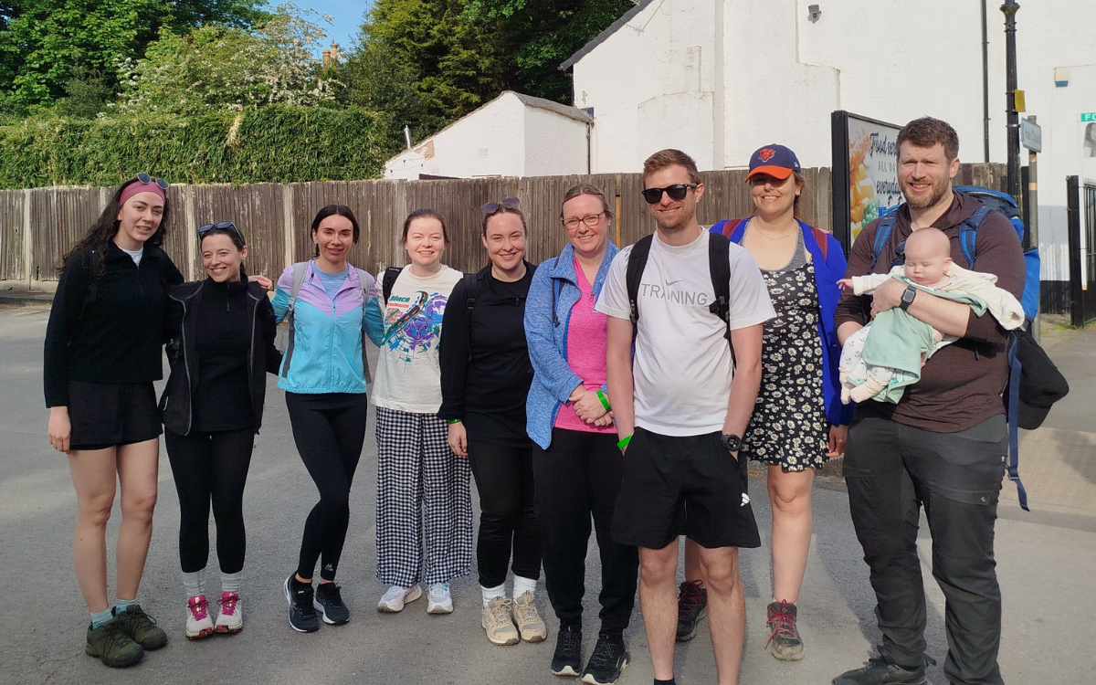 Team take on marathon walk for sensory garden